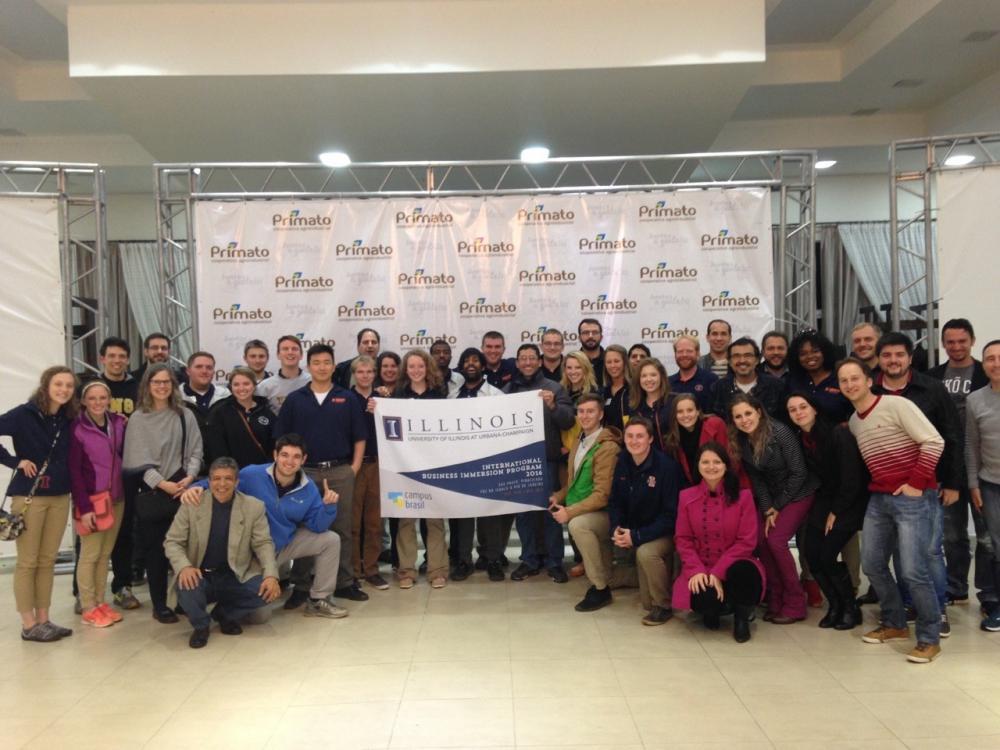 IBIP students holding up an Illinois sign at Western Parana State University