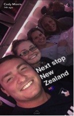 Students on a plane with the words "Next stop New Zealand!"