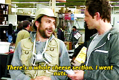 Charlie Day gif saying "There's a whole cheese section. I went nuts"