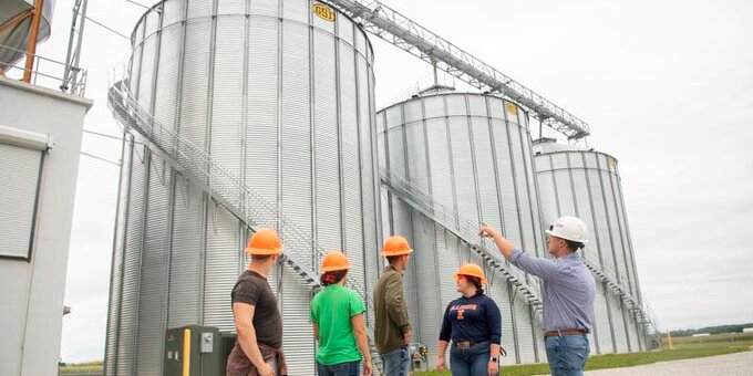 Professor teaching students about silos