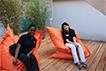 Students sitting in shell chairs