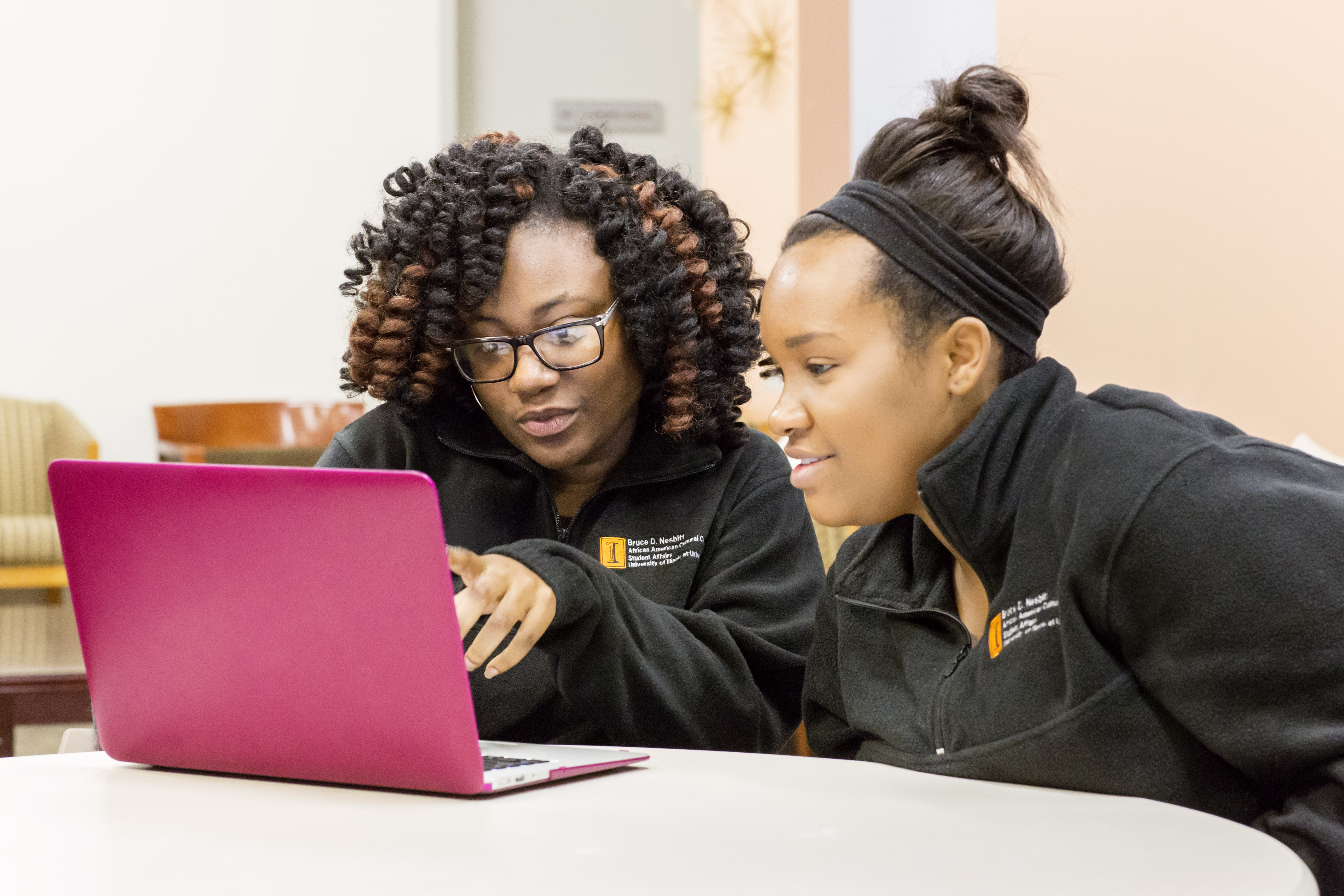 Students working on laptop computer