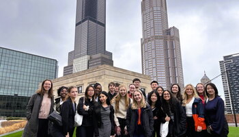 ACE students pose in front of Chicago skyline