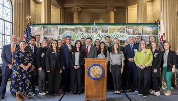 ACE students and faculty pose with Illinois Governor JB Pritzker 