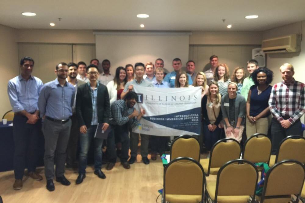 Students holding an Illinois sign in a classroom