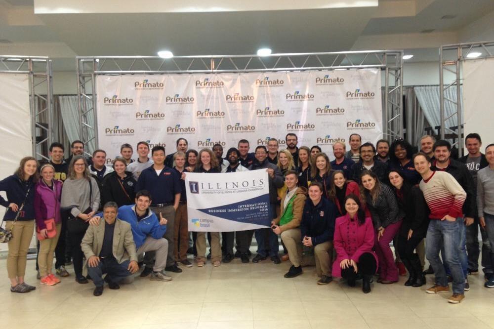 IBIP students holding up an Illinois sign at Western Parana State University