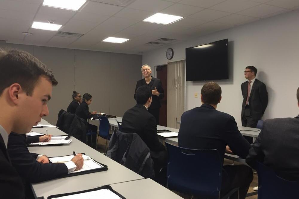 ACE students listening to a presentation