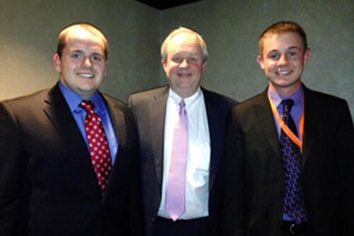 Michael Gill and Doug Yunker, connect with alumnus Michael Dykes