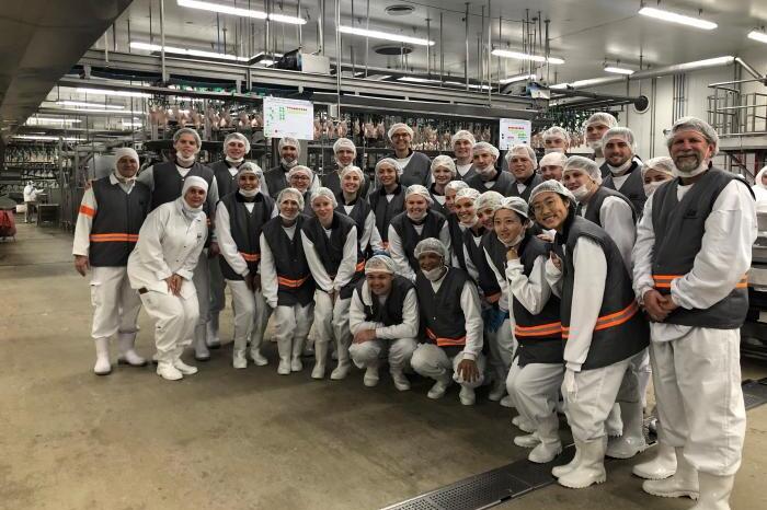 Study abroad students in the poultry center