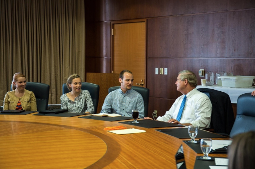 Students speaking with United States Secretary of Agriculture, Tom Vilsack