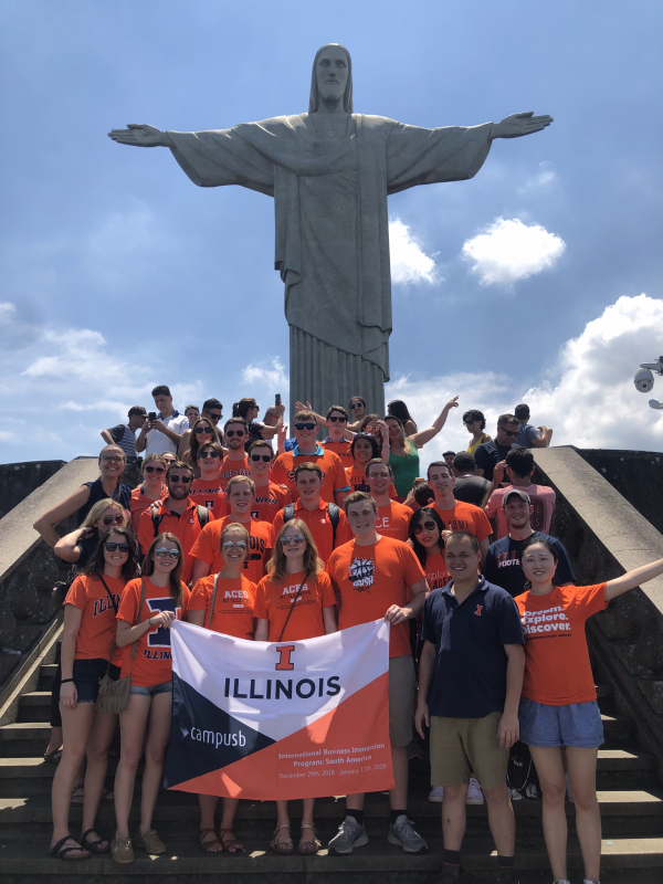 ACE students standing in front of the statue of Christ the Redeemer